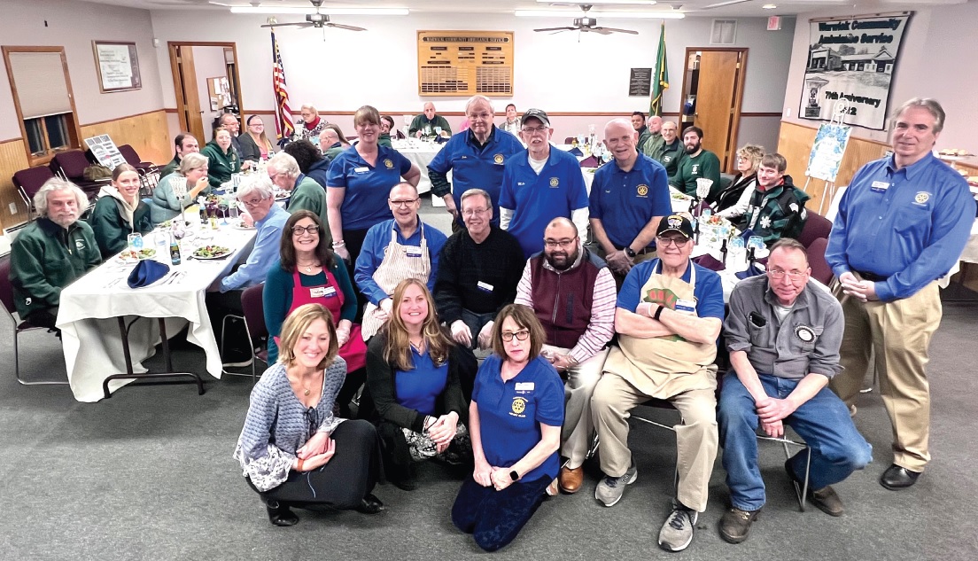 The Rotarians prepare dinner for EMS volunteers - Photo by Wayne Patterson