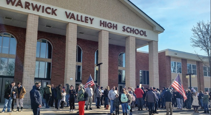 Nearly a hundred people, including parents, community members and students assembled at Warwick Valley Central District Schools on Wed., Feb 16, to protest the use of masks in school - Photos By: Lourice Angie.
