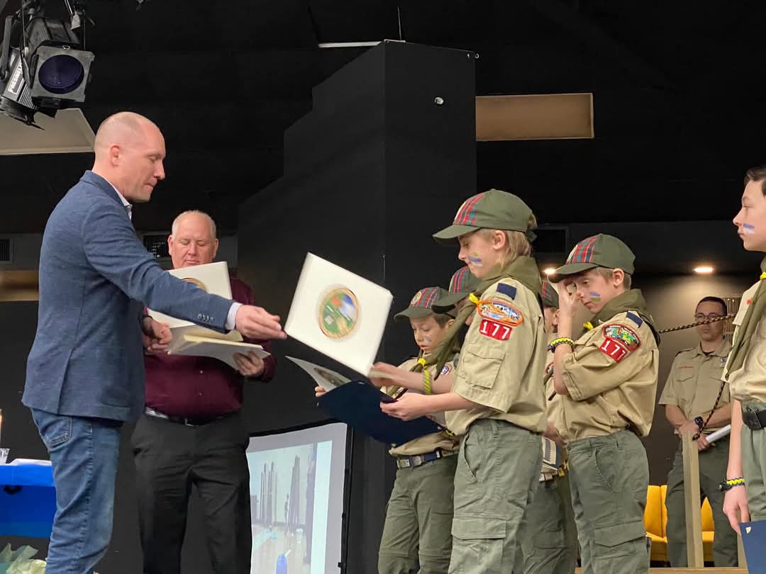 Warwick Town Supervisor Jesse Dwyer honors the scouts at the Arrow and Light award ceremony